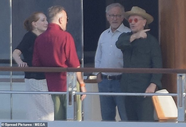 She was seen hugging and catching up with Spielberg, 77, Bono, 64, and Edge, 62, as well as their friends and family.