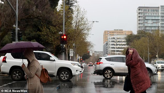 Adelaide (pictured) is expected to see a high of 16C with some sunshine on Saturday, while Sunday is forecast to see a high of 17C but with a chance of showers.