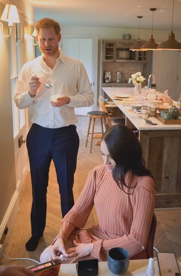 Public outcry over the use of public money through the Sovereign Grant prompted Harry and Meghan to cover the cost of renovating Frogmore Cottage themselves. Above: The couple in the kitchen at the property