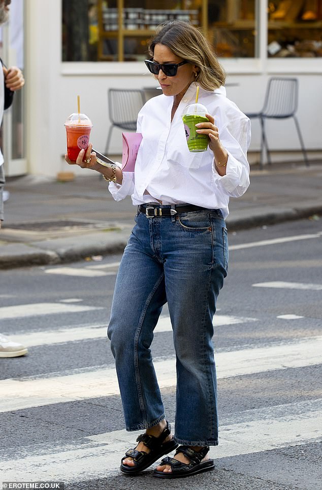 The beauty accessorized her daytime look with a pair of sunglasses and a thick black belt.