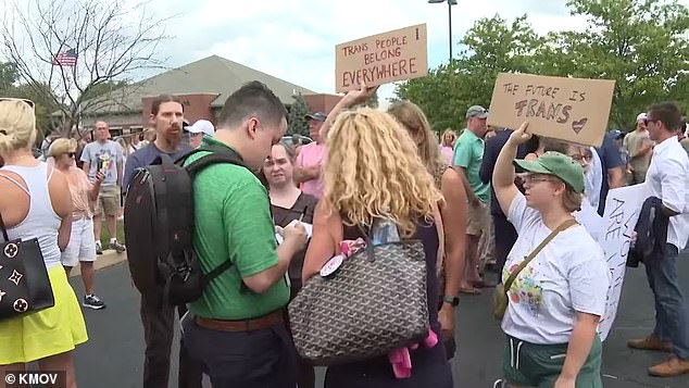 Protesters and counter-protesters attended the press conference.