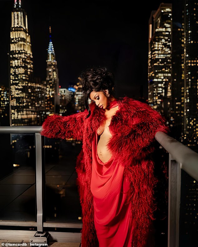 In her announcement, she showed off her baby bump in a plunging red dress as she posed on a balcony at night.