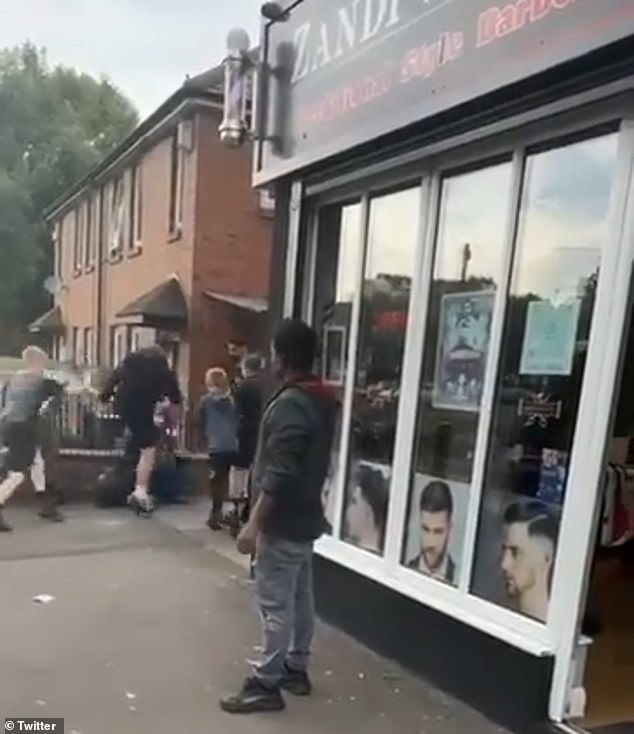 In a shocking moment towards the end of the clip, the youths appear to turn on their victim and repeatedly kick him in the head.