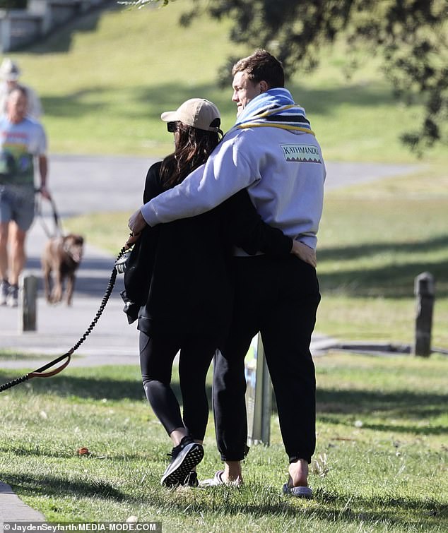 The couple seemed to have nowhere else they'd rather be as they strolled through a nearby park.