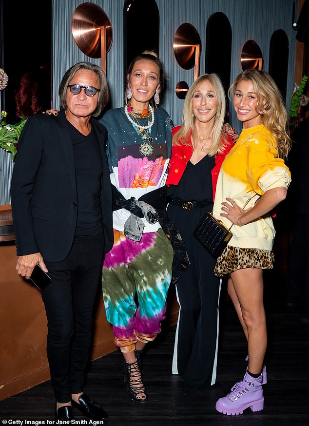 Alana is pictured with her father Mohamed Hadid (left), mother Mary Butler and sister Marielle (far right) in 2019.