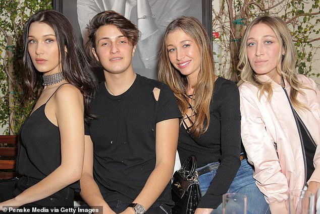 Bella, her brother Anwar, Marielle and Alana all appear together in the photo.