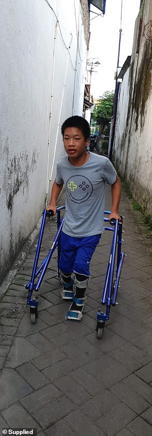 Jonathan, 14 (pictured), was recently cared for by his grandparents in Indonesia, but the family suffered a devastating blow when his grandfather died.