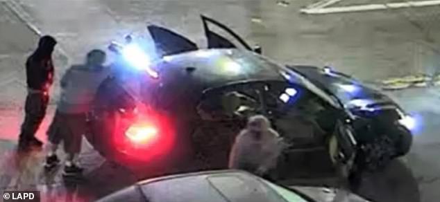 There have been no arrests since the May 24 murder, and police have only now released images of the three suspects and their getaway car (seen here).