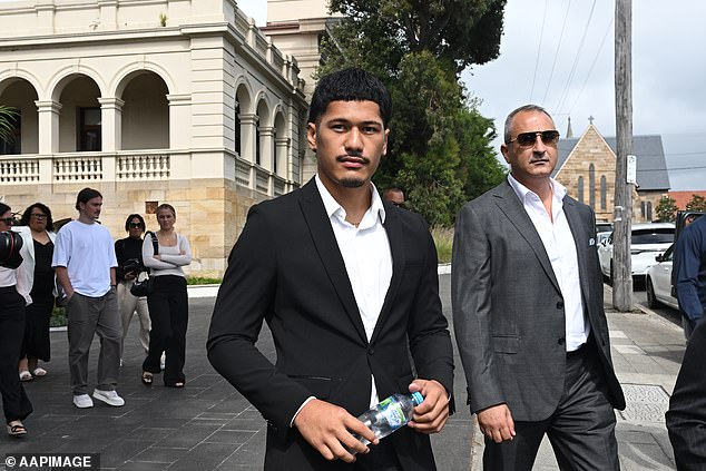 Amone (pictured centre outside court in December last year) was sentenced to a two-year intensive correction order for the hammer attack.