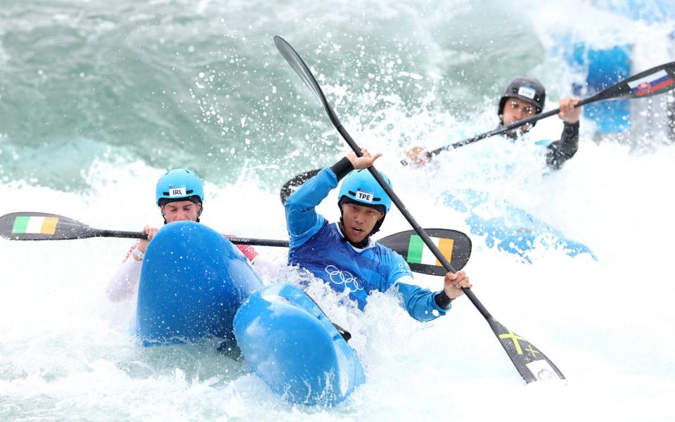 Kayak cross race participants collide