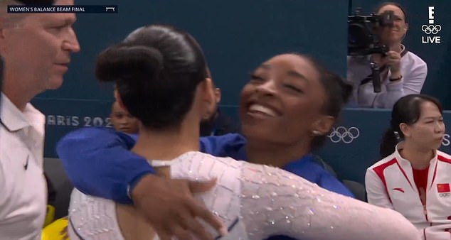 Her teammate Simone Biles was seen trying to lift her spirits after the unfortunate mishap.