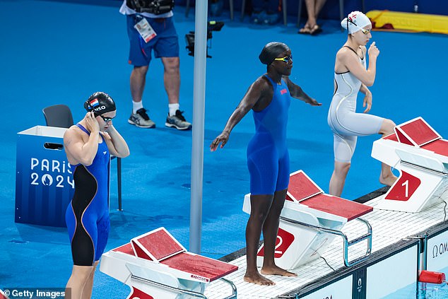 Alonso (seen left before her race) just missed out on qualifying for the semi-finals of the 100m butterfly.