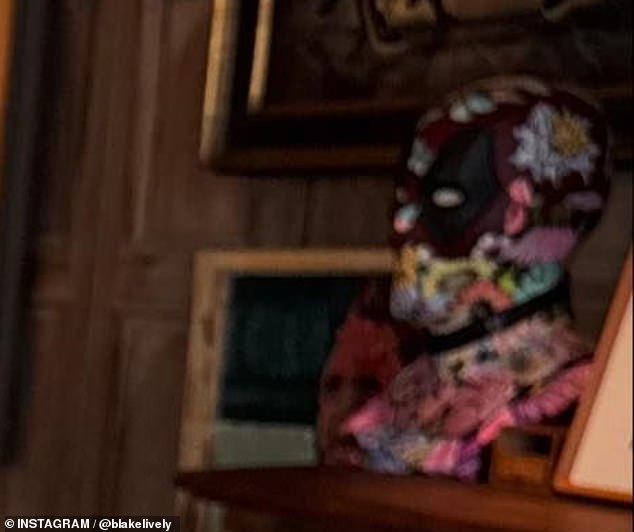 While Lively's sense of style was the focal point of the post, several astute fans took an interest in a floral Deadpool mask that was perched atop a wooden piano in the Tribeca home.