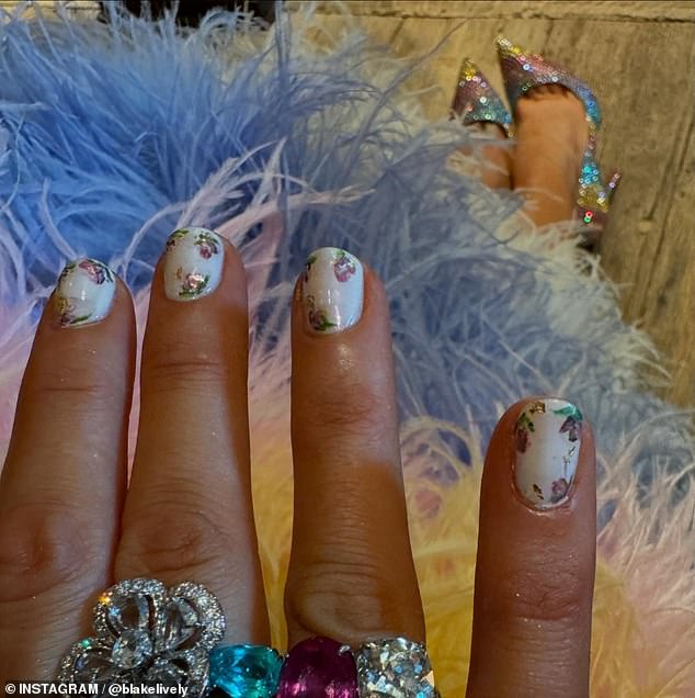 Lively proved to her fans that no detail is too small when it comes to her sense of style, as she showed off her immaculately painted nails with her rainbow Christian Louboutin heels in the background.