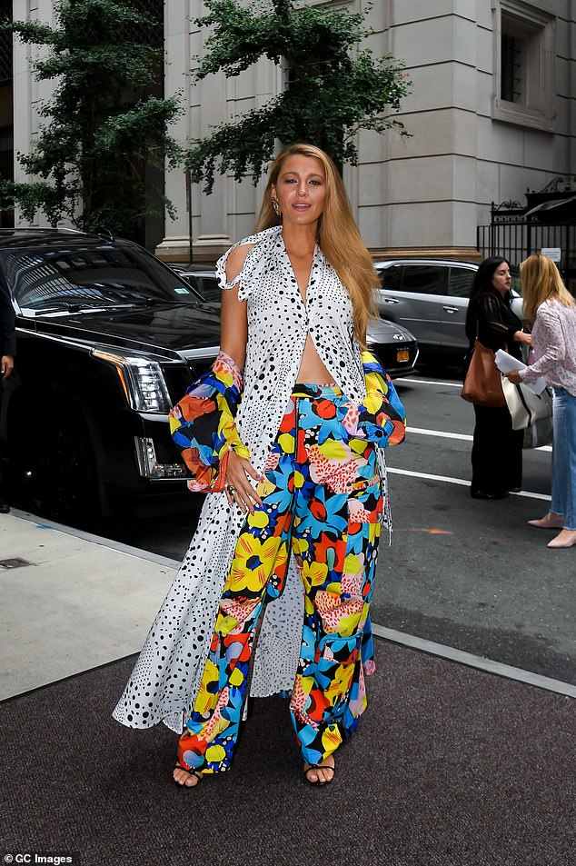 The Rhythm Section actress paired a black and white printed dress over a pair of wide-leg pants with multi-coloured flowers and sandals.