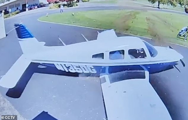 Footage shows an unsuspecting golfer on the practice green when a single-engine Piper PA28 plunged downwards.