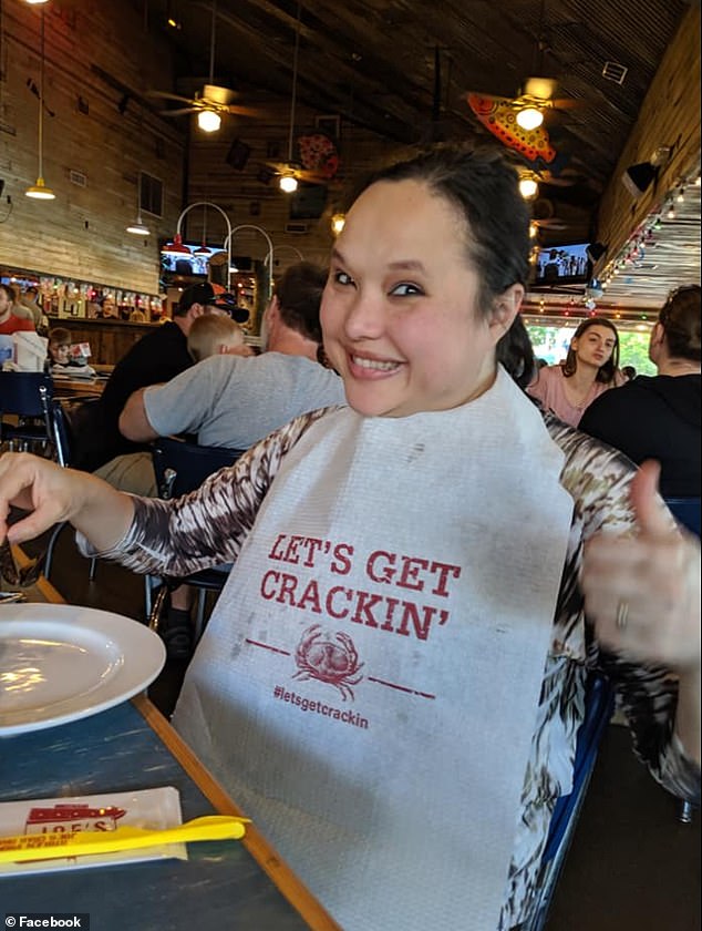 The mother of two smiles for the camera as she enjoys a meal, according to her social media account.