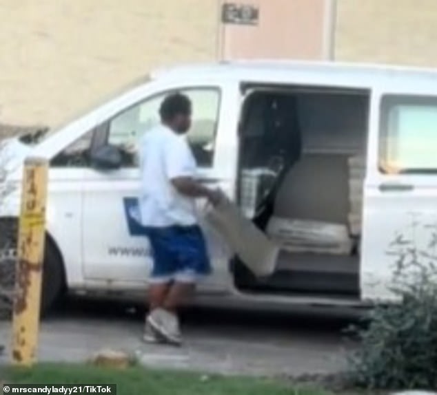 The alleged postal worker then returned to his truck, where he took out more mail to throw away.