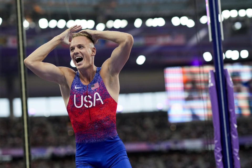 Sam Kendricks of the United States reacts during the men's pole vault final at the 2024 Summer Olympics, Monday, Aug. 5, 2024, in Saint-Denis, France. (AP Photo/Bernat Armangue)