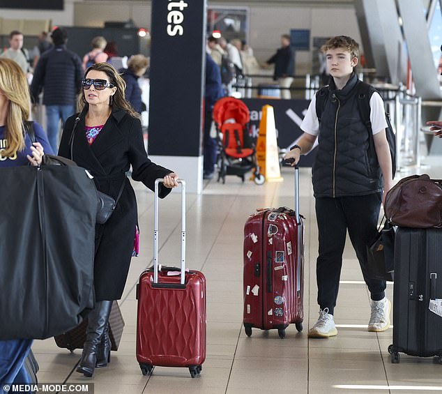 The Melbourne-born star looked relaxed and radiant as she enjoyed the company of her loved ones as they navigated the bustling airport.