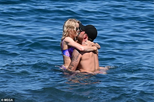 The former Coronation Street actress and her TOWIE star boyfriend couldn't keep their hands off each other as they shared a passionate kiss in the sea together.