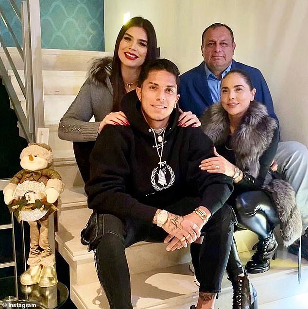 A photo from December 2019 shows Martha (top left), her brother Carlos (bottom left), and their parents.