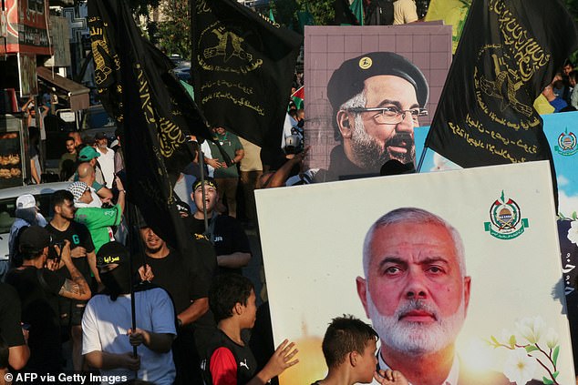 People take part in a march called by Palestinian and Lebanese youth organizations in the southern Lebanese city of Saida on August 5, 2024, to protest against the killing of Hamas chief Ismail Haniyeh.