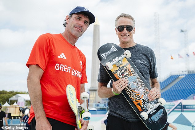 There is a 40-year age gap between Haohao and Team GB star Andy Macdonald, 51, left, who is pictured here alongside skateboarding legend Tony Hawk.