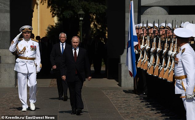 An alleged assassination plot against Vladimir Putin by Ukraine was stopped after Russia's defense minister called his counterpart at the Pentagon, Moscow said. Pictured: Russian President Vladimir Putin and Defense Minister Andrei Belousov at the annual Navy Day parade on July 28, 2024 in St. Petersburg, Russia