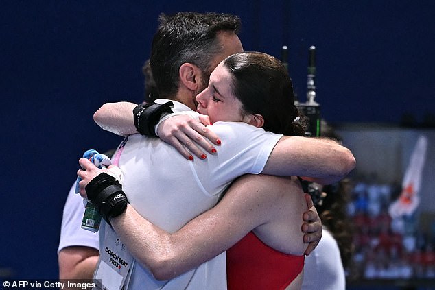 Team GB star receives tearful hug from coach after losing medal