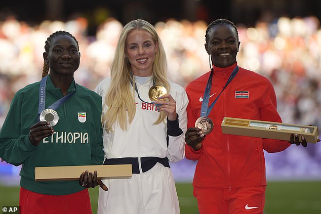 There were also smiles through the tears as Hodgkinson posed with silver medallist Tsige Duguma (left) and bronze winner Mary Moraa (right).