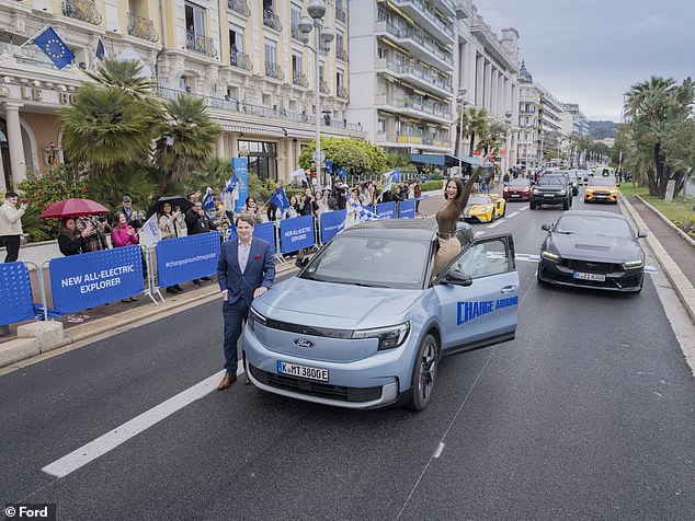 Adventurer Lexie Limitless (Lexie Alford), pictured right, became the first person to drive around the world in an electric vehicle in Ford's new Explorer SUV. The world record was set in Nice on March 26, 2024, and Ford CEO Jim Farley (left) greeted Lexie at the finish line. The Ford Explorer officially went on sale as soon as the record was completed.