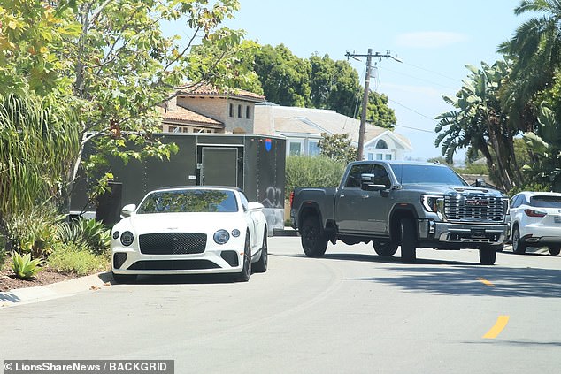 Josh appeared to be driving the truck down the street.