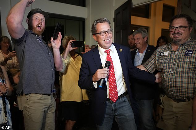 Ogles celebrates his recent primary victory in Franklin, Tennessee, on August 1, with supporters.