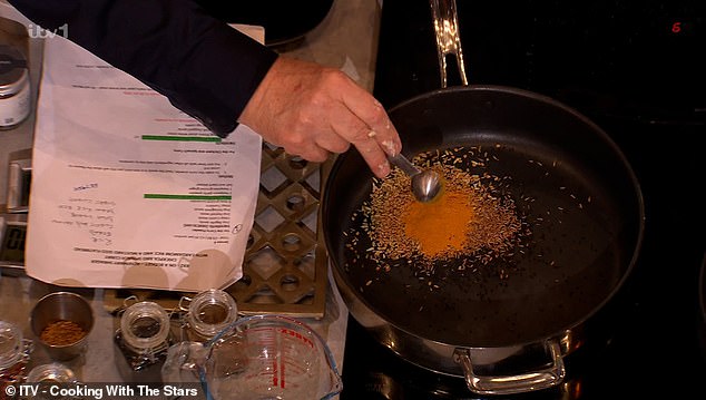 To start, Christopher began by toasting his curry spices in a pan and Rosemary advised him that toasting them would help 