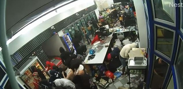 A violent robbery occurred at this convenience store at a gas station in Oakland, California. About 100 people entered and emptied the shelves, but the police never showed up.