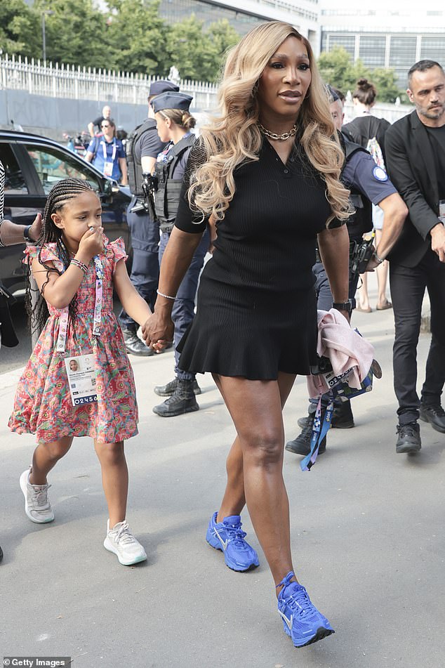 Williams has been involved in several sports at the Paris Olympics and is pictured with her daughter Olympia as they arrived for the women's artistic gymnastics team final last week.