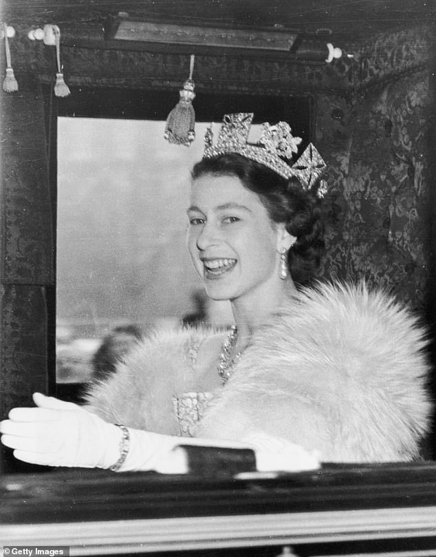 Queen Elizabeth II, wearing the official tiara, heads to Westminster to preside over the first official State Opening of Parliament since her accession to the throne in 1952