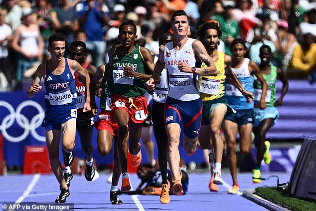 The cameraman's actions came so close to causing a damaging collision on the track.