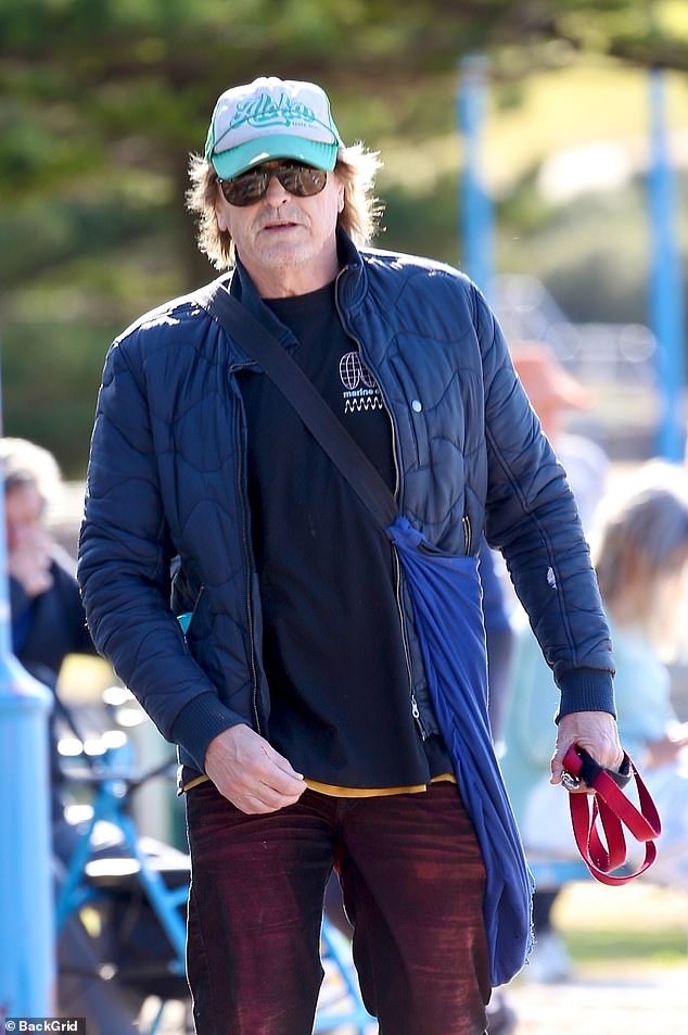 The 64-year-old actor looked a far cry from his 1980s heartthrob persona, cutting a relaxed figure in casual attire.