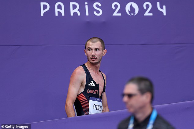 Team GB's Mills reacts after competing in the first round of the men's 5000m