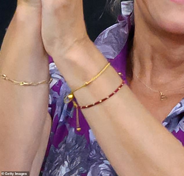 Sophie revealingly wore a burgundy and gold beaded bracelet on her wrist.