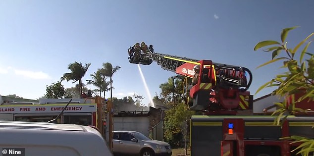 Three fire crews were dispatched to tackle the blaze (pictured), which caused the roof to collapse, while Ms Udenzi was found inside and rescued by a firefighter.