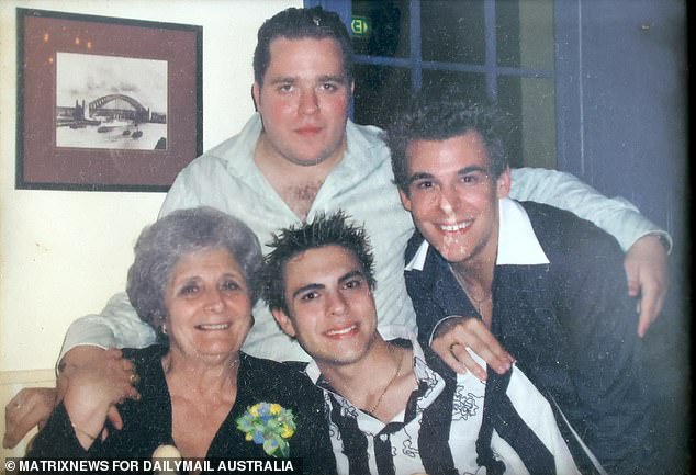 John (black and white T-shirt), pictured as a young man at his grandmother's birthday party, had a fiancée, a great job and was physically fit before the neurological disorder took hold.