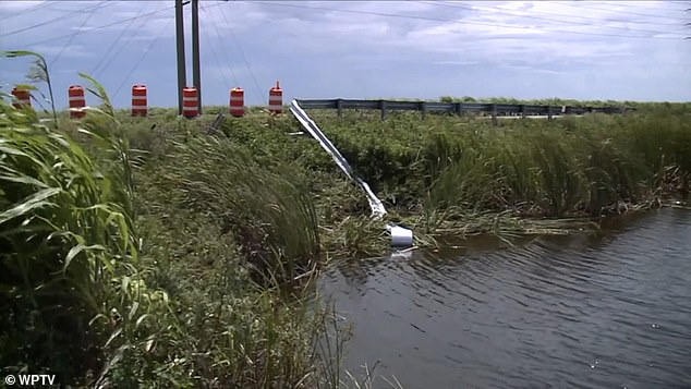 Police said the entire family was traveling together in a pickup truck when the driver missed a curve and crashed into a guardrail, causing the vehicle to roll into a nearby canal.