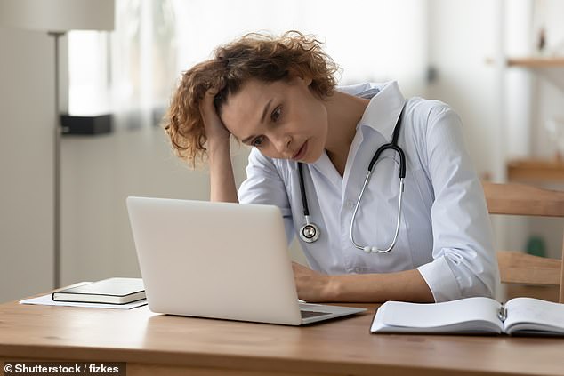 According to GMC findings, almost half (48 per cent) of GPs are struggling to balance their workload and personal life (file image)