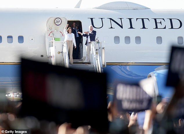 Kamala Harris and Tim Walz disembark from Air Force Two