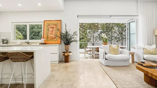 The couple made several improvements to the elegant property over the past two years, including replacing the hardwood flooring, laying new carpet and landing a new paying job. Pictured: the kitchen