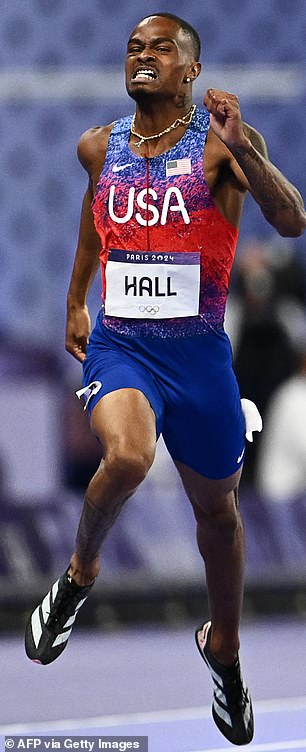 Hall became the fourth fastest man in history over the distance to cross the finish line at the Stade de France.