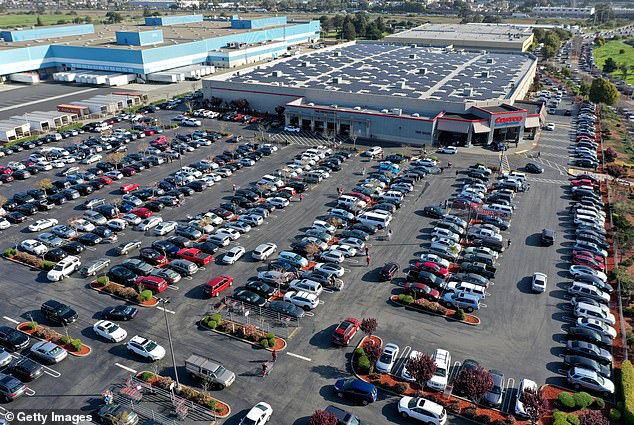 Pictured: A crowded parking lot at a Costco store in Richmond, California.